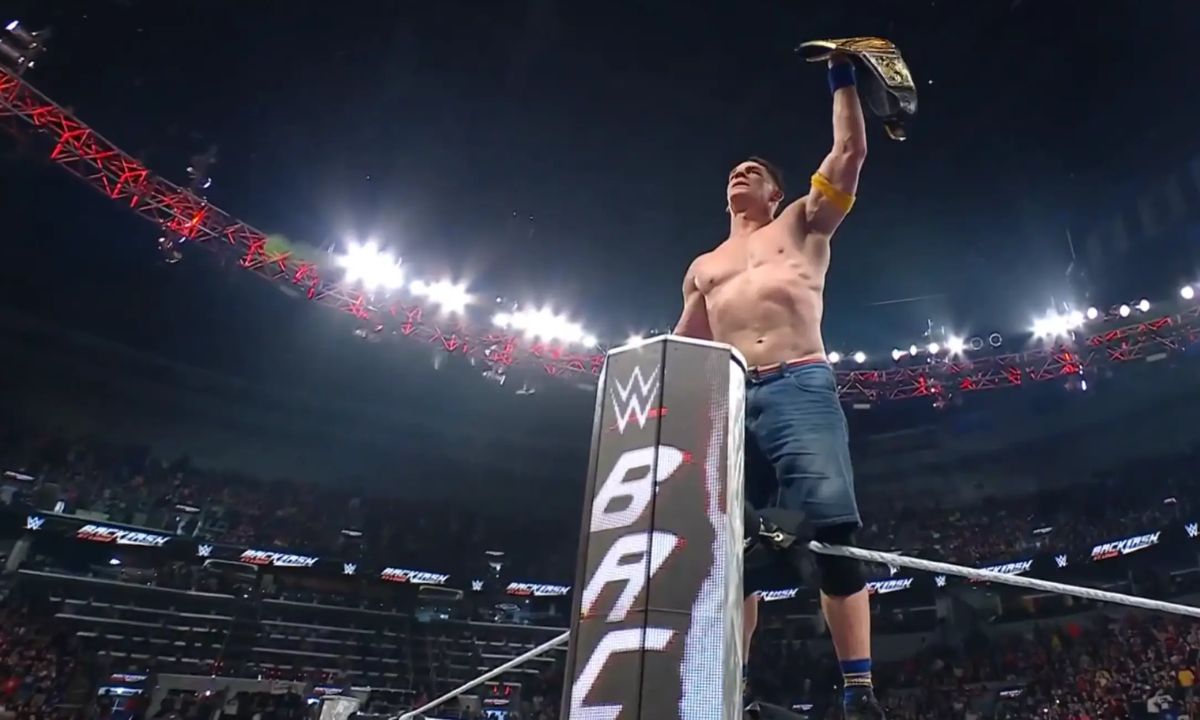 John Cena celebrates his win at WWE Backlash 2025.