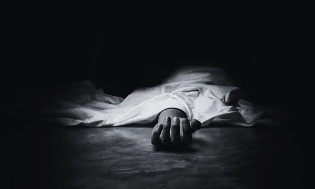 a hand on a bed