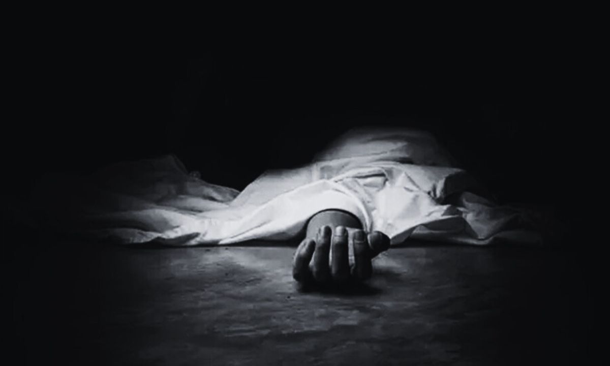 a hand on a bed