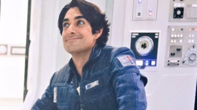 Eman Esfandi as Ezra Bridger with short hair and clean-shaven look in Ahsoka Season 2