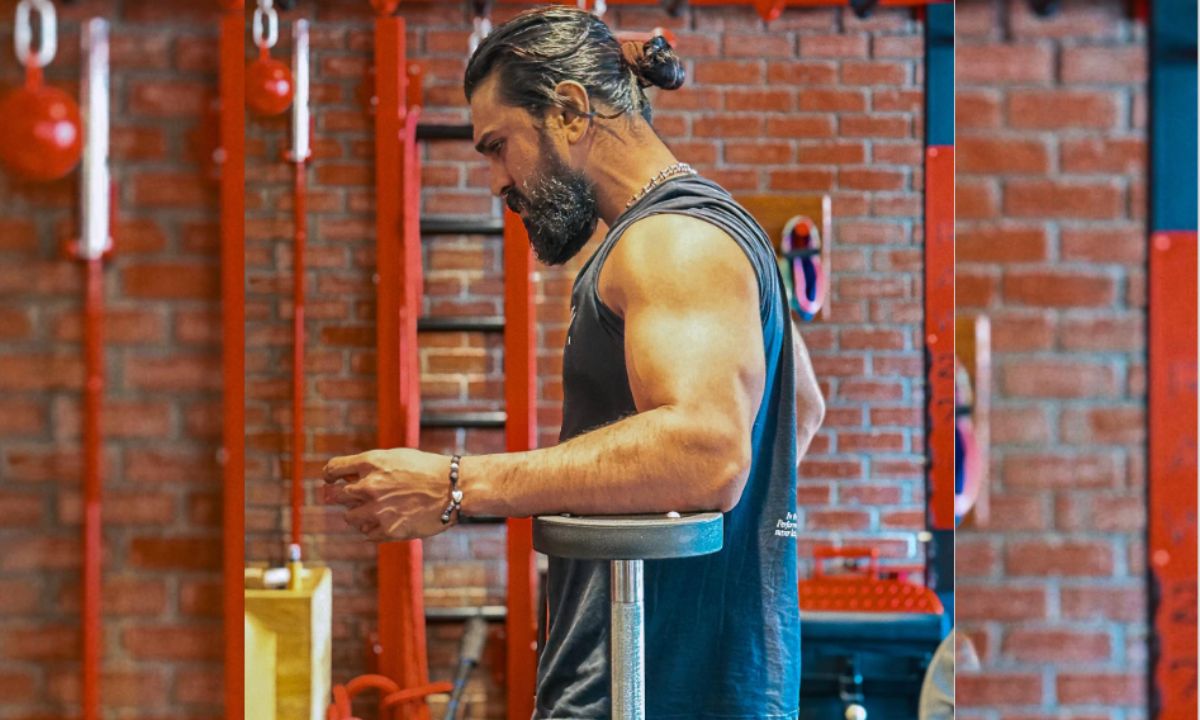 Ram Charan training at the gym in a sleeveless outfit, preparing for his role in Peddi.